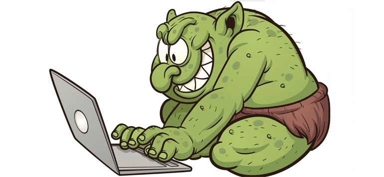 Cartoon of an 'internet troll' with a real green troll grinning as it types on a laptop