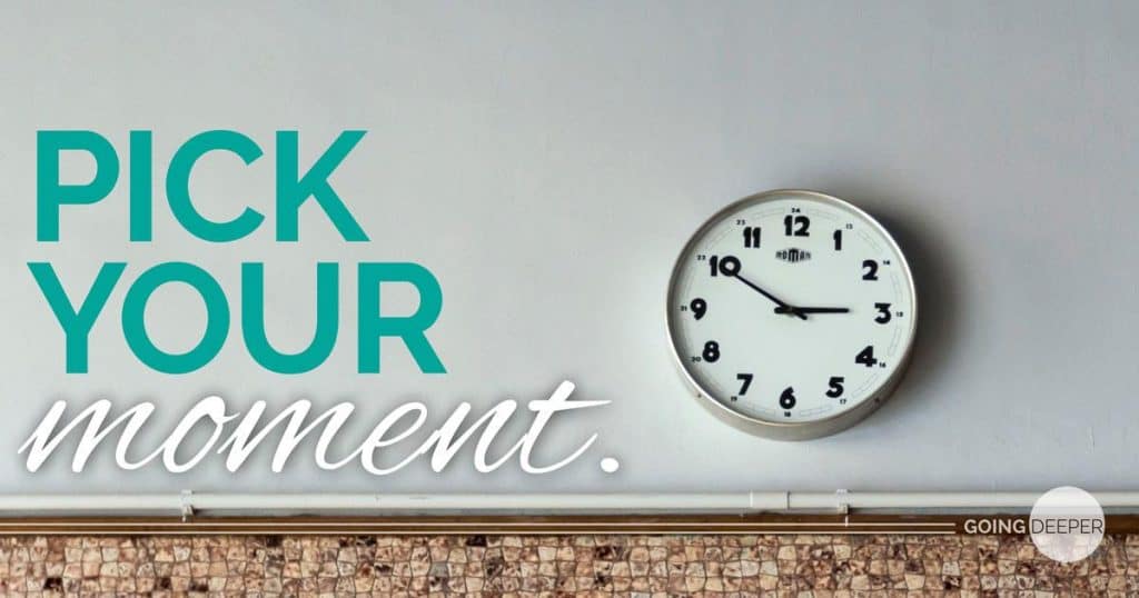 Picture of a clock on a wall with the slogan 'pick you moment'
