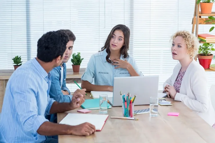 team discussing business strategies