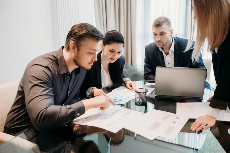 team working on digital PR and online reputation management for financial firms