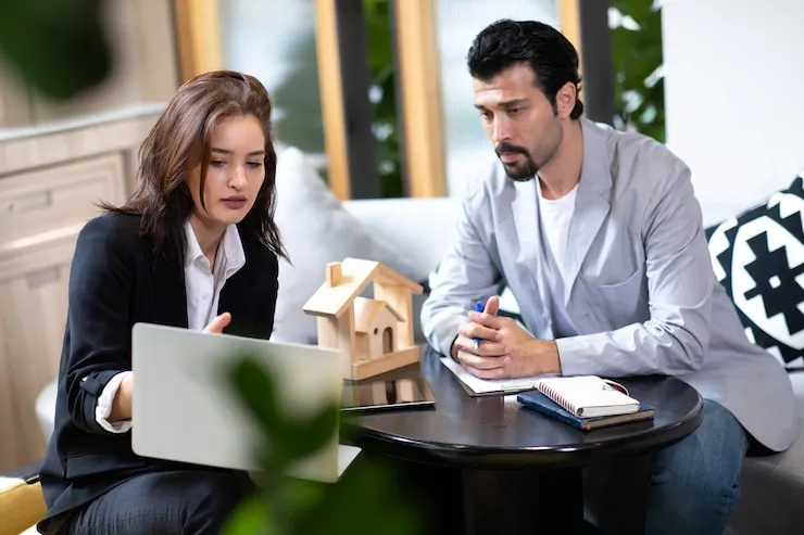 real estate professionals discussing plans