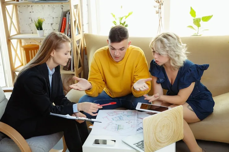 real estate professionals discussing plans